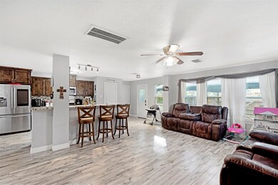 Open concept kitchen and living room
