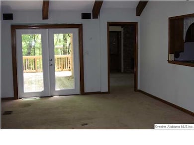 French doors from sun room to deck