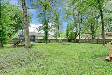 Enjoy evenings in the private, treed backyard retr