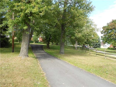 Exterior Front. driveway into home