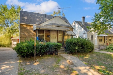 Bungalow-style house featuring a porch and roof with shingles