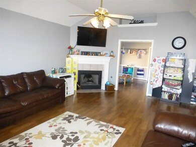 Large Great Room with new wood laminate floors, up