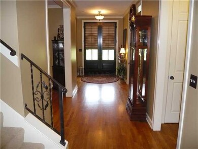 Rich hardwood floors! Welcoming entry.