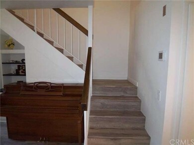 New wood-look floors flow seamlessly through the h