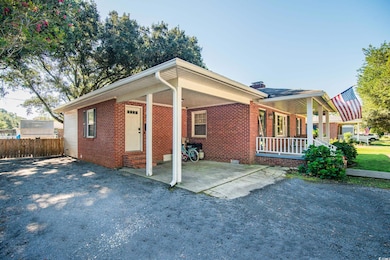 View of front of property with covered porch