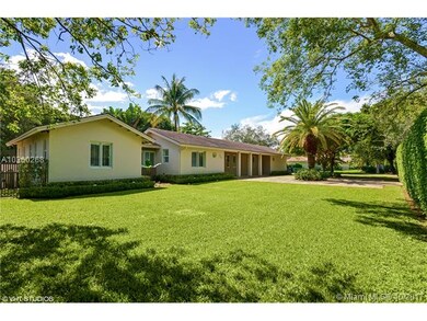 Front yard, home has both circular and side drivew
