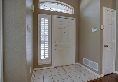 Tiled foyer to greet family & friends!