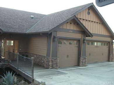 Front entry and garage with elegant stone work
