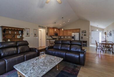 Open Floor plan with vaulted ceilings & wood lamin
