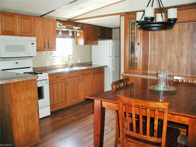 Nice eat-in-kitchen w/gas stove. Laundry w/washer 