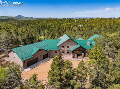 Birds eye view of property with Pikes Peak View