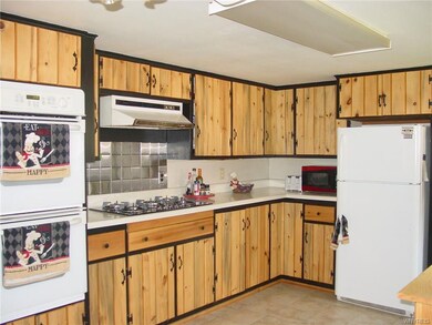 All wood cabinets refinished beautifully! With new