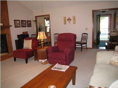 Another view of the living room looking back towar