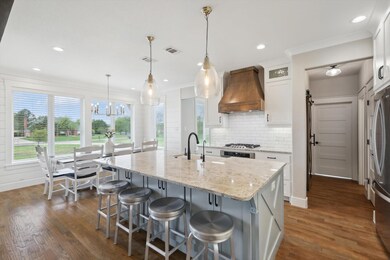 Farm house sink, double ovens, reverse osmosis drinking water, and whole house water filtration system.