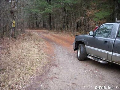 View Gravel gated private road to lot
