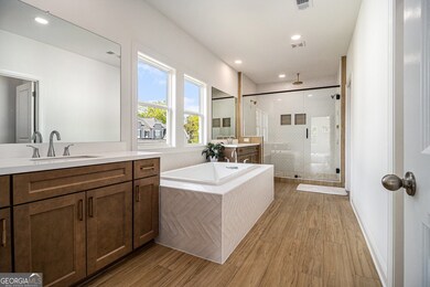 The Spa-Like Ensuite is outfitted with rich Wood a
