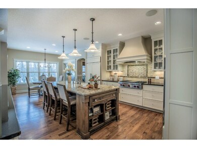 Gourmet kitchen with top-of-the-line appliances: W
