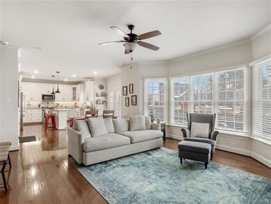 Open concept family room, dining area and kitchen