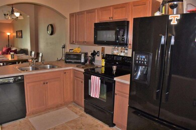 Solid Wood Cabinets & Black Appliances!