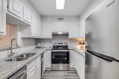 Beautifully upgraded kitchen with granite counters