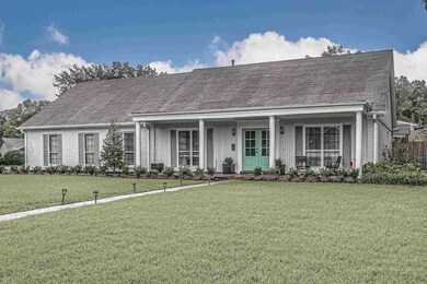 View of front of home featuring a front lawn