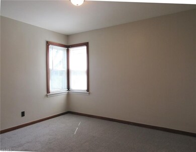 The second bedroom offers new light fixture, fresh