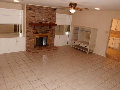 Den/Family. gaslog fireplace with built-ins and ce