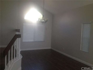 living and dining room with new laminate wood floo