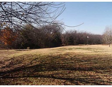 Land/Lot. 2.33 (mol) acres with small creek on bac