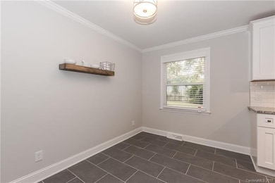 Family room flows smoothly into dining space