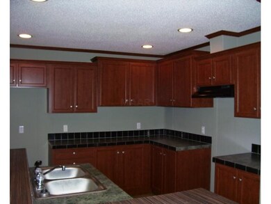 Lots of cabinets in kitchen.