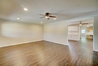 Living room featuring dark hardwood / wood-style f