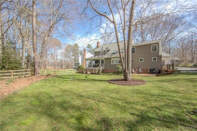 View of rear fenced yard with beautiful views the