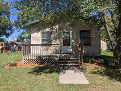 Charming home with front and back decks, big yard,