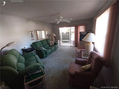 View of living room and patio in background (taken