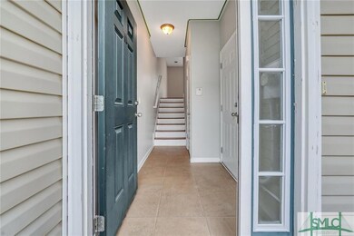 FRONT DOOR INTO ENTRY FOYER