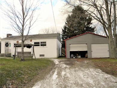 Home has a 2 car detached garage