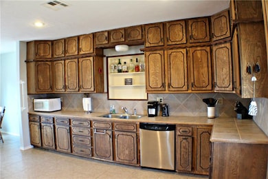 Spacious eat-in kitchen with plenty of storage.  R