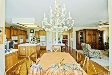Viewing Kitchen and Family room from Breakfast eat