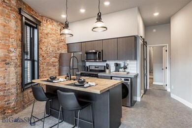 Kitchen featuring stainless steel appliances, hang