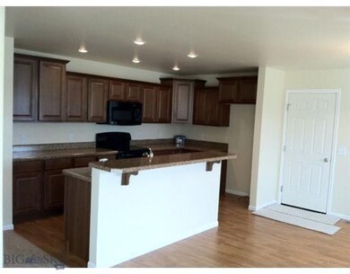 Kitchen. Photo of similar home.