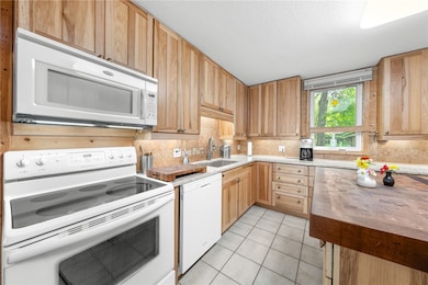 Note the handmade butcher block island, made from