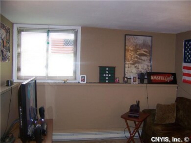 Living Room Living room with large window and shel