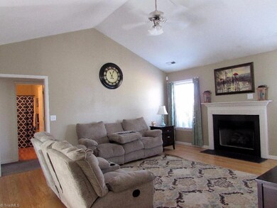 Plenty of room for family & friends in this large great room.  Gas logs make it easy to light a fire and warm up in the wintertime.