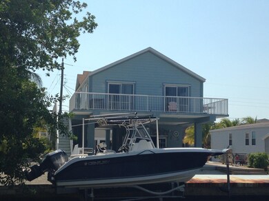 concrete dock with boat lift
