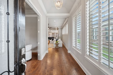 Step into effortless elegance—this entryway opens