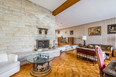 Dramatic beamed, sunken Living Room, one large Lan