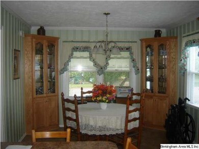 Breakfast room with built in corner china cabinets