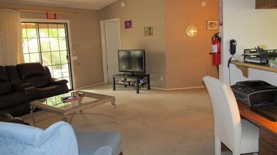 GREAT ROOM EXITS TO COVERED PATIO