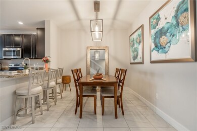 Dining space with baseboards and recessed lighting